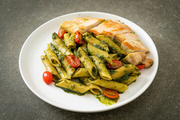 penne pasta in pesto sauce with grilled chicken