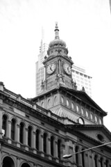 Landscape view of historical architecture in black and white. Low angle view of old buildings in the city in black and white.