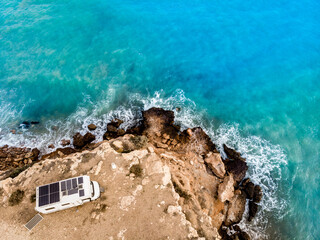 Camper on coast in Spain. Aerial view