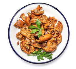 Fried Chanterelle  Mushrooms isolated on a white background. Top view, flat lay. Autumn Food concept..