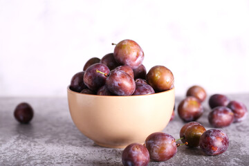 Fototapeta premium fresh plum is lying a lot on the table