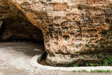 Poster Gutmanis cave is an ancient landmark in Latvia © Fyle