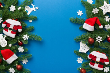 Christmas background with fir branches and Christmas decor. Top view, copy space for text