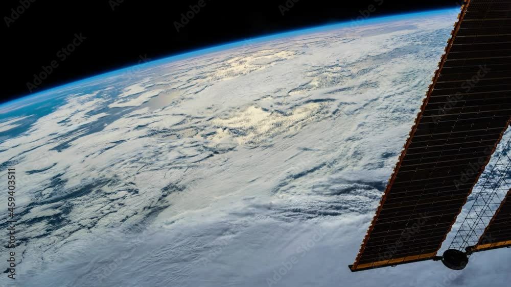 Wall mural flight over the earth's surface, made from a space station. 3d rendering