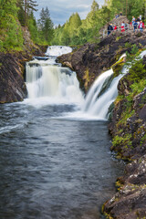 Fototapeta na wymiar Kivach waterfall in Karelia Russia