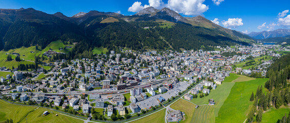 Aerial view around the city Davos in Switzerland on a sunny day in summer.