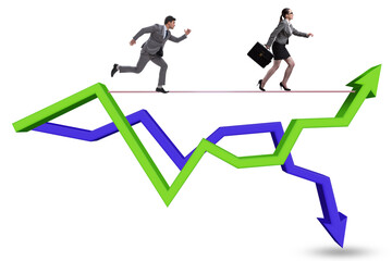 Businessman balancing on tightrope on line chart