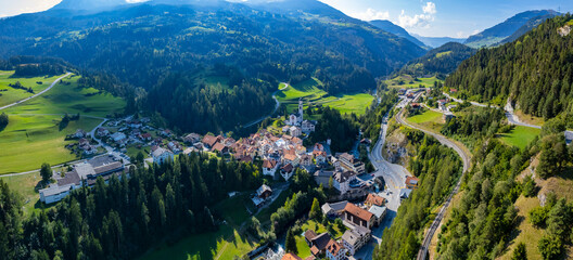 Aerial view around the village Albula/Alvra in Switzerland on a sunny day in summer.