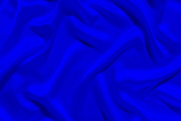 Obraz premium Crumpled satin fabric. Beautiful and flowing drapery lines.