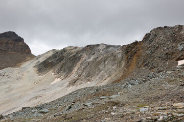 Fototapeta na wymiar Barren eroded mountains of the Bergalgapass in Switzerland