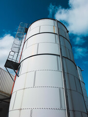 building with blue sky and clouds