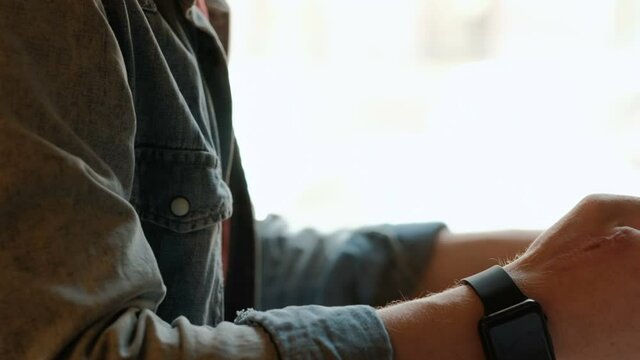 Young professional using smart phone on the go