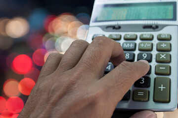 calculator in hand