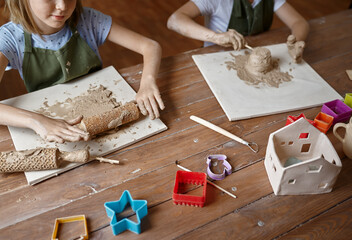 Children works with clay, modeling class, workshop