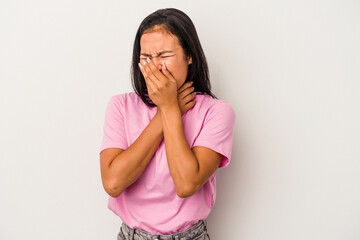 Young latin woman isolated on white background  suffers pain in throat due a virus or infection.