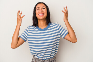 Young latin woman isolated on white background  screaming to the sky, looking up, frustrated.