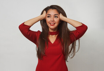 Obraz premium Young woman with long brown hair isolated on white