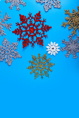 Snowflakes on a blue background. Christmas decor.
