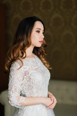 Fototapeta premium Young stylish asian woman in white dress, vintage style, natural, innocent, smiling in hotel