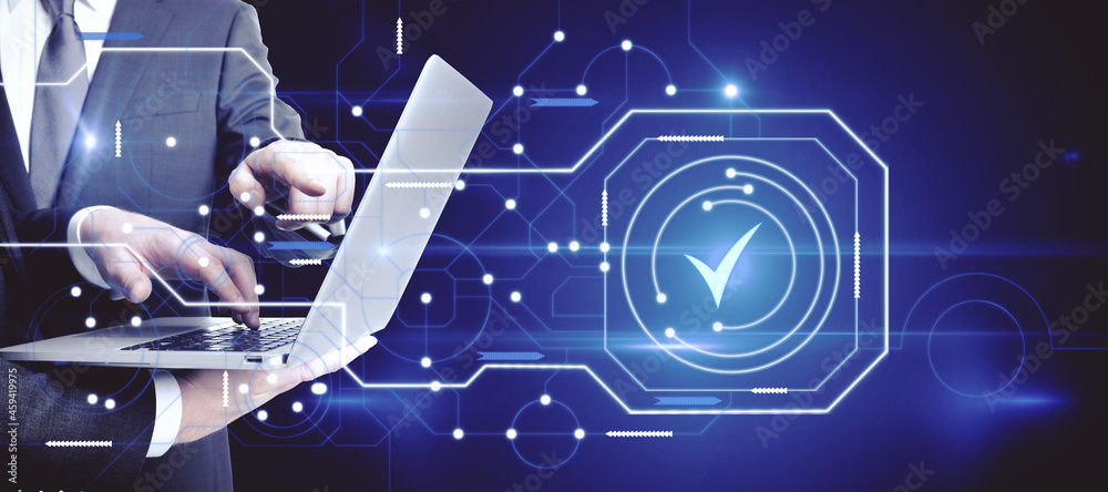 Poster Close up of businessmen using laptop with abstract glowing digital business circuit network and tick mark interface on blurry background. Technology, teamwork, choice and completion concept. 