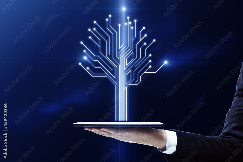 Poster close up of hand holding tablet with abstract digital circuit tree on blurry blue background. inform