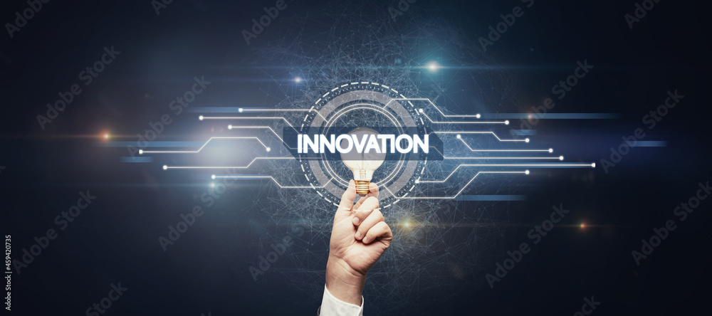 Poster close up of hand holding abstract glowing polygonal lamp hologram circuit on gray background. innova