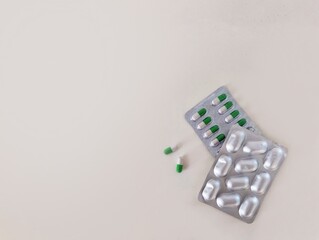 Pills blisters photo on white background. Top view.