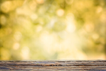 Autumn background. View from the window on a blurred background with a wooden window sill.