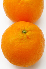 close up of orange fruit isolated on white background