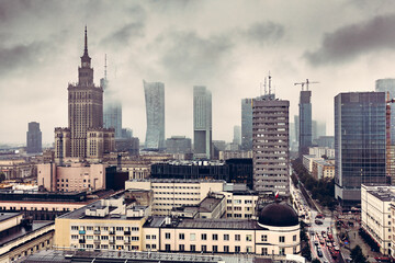 Fototapeta premium Warsaw, Poland panorama, dark clouds and fog