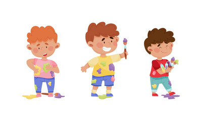 Cute funny creative boys in stained clothes painting with brushes set cartoon vector illustration