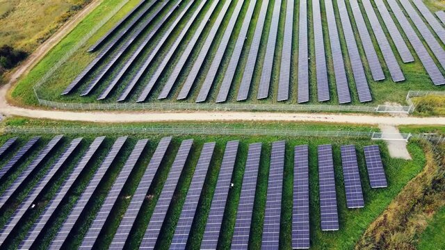 Bird's Eye View Solar Panel Power Plant In Utby, Gothenburg, Sweden - aerial shot