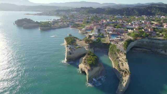 Aerial drone view video of iconic white rock formations of Canal d' Amour in Sidari area, North Corfu island, Greece