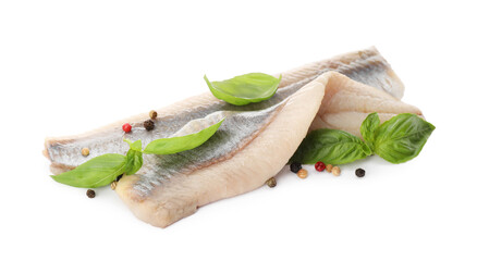 Delicious salted herring fillets with basil and peppercorns on white background