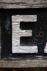 Written Wording in Distressed Typography Found Letter E