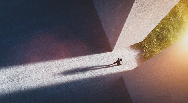 Businessman walking to open gate to a new better green world