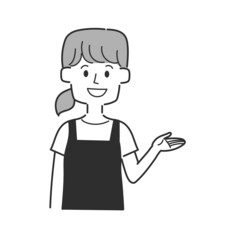 案内をしているエプロンを着た店員