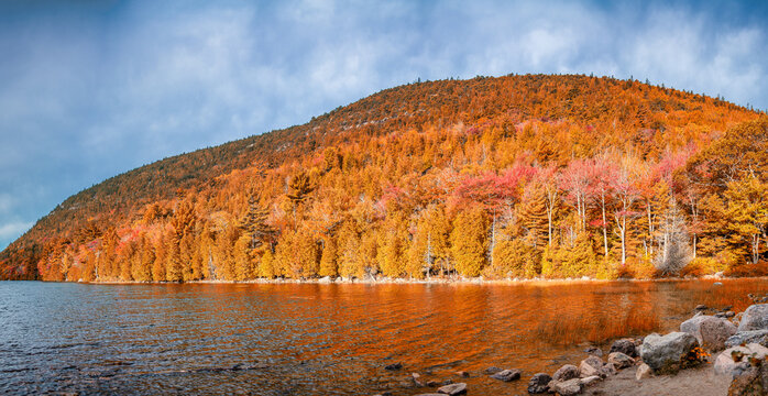 Eagle lake and foliage trees colors in Acadia National Park, Maine, panoramic view.