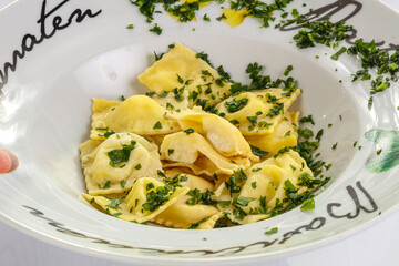 Italian traditional dumplings tortelini with meat