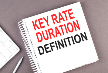 KEY RATE DURATION DEFINITION text on notebook with calculator and pen,business