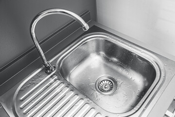 stainless steel sink basin for washing or cleaning utensil in the kitchen