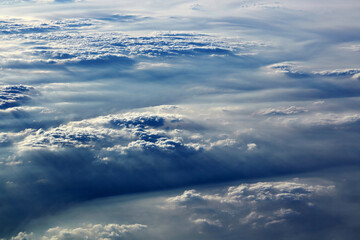 Naklejka na ściany i meble Clouds background, at high altitude