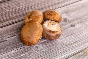 Raw brown champignons mushroom heap