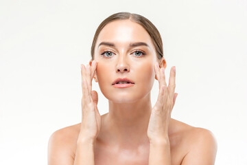 Beauty shot of clear glowing skin woman touching her face on white isolated studio background for skincare concepts