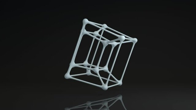 Loop animation of a 3d tesseract. Hypercube in the studio with reflections. The idea of infinity, the fifth dimension, the inverted space.