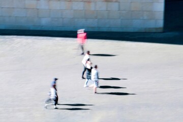 Fototapeta na wymiar blurred people walking on the street in Bilbao city spain