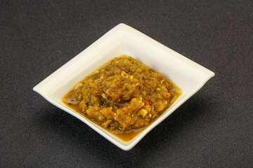 Green spicy sauce in the bowl