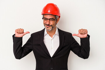 Middle age architect caucasian man isolated on white background  feels proud and self confident, example to follow.