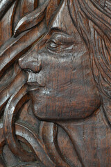 Fototapeta na wymiar Carving of a woman within the church at Launceston Cornwall