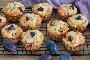 cake rack with plum muffins